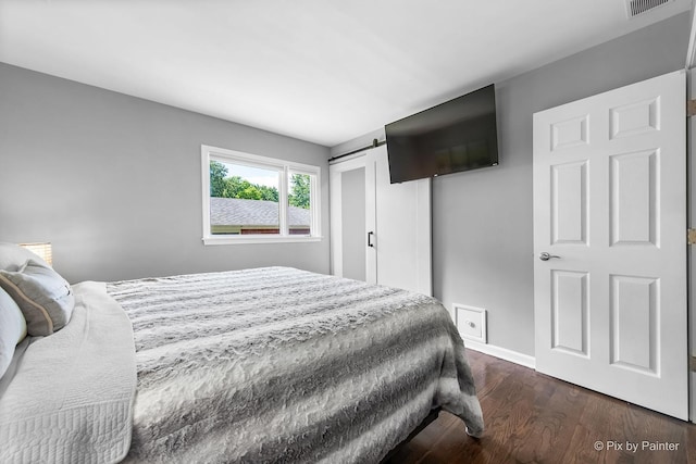 622 Katherine St, Saint Charles, IL 60174 - bedroom with dark wood-style flooring and baseboards