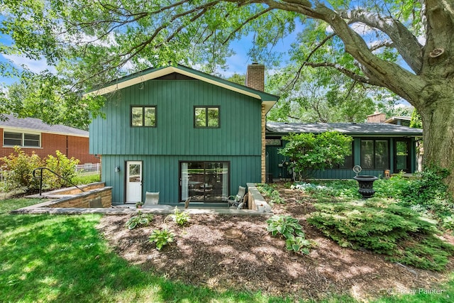 622 Katherine St, Saint Charles, IL 60174 - rear view of house with a chimney