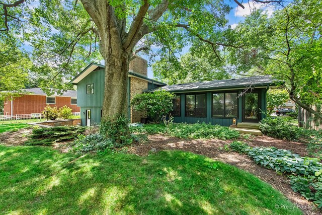 622 Katherine St, Saint Charles, IL 60174 - rear view of house with a chimney and a yard