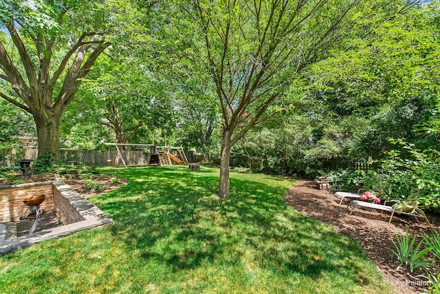 622 Katherine St, Saint Charles, IL 60174 - fenced backyard with a playground
