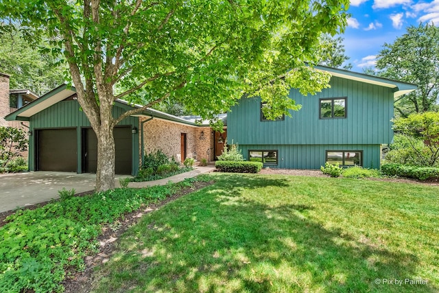 622 Katherine St, Saint Charles, IL 60174 - view of property exterior featuring a yard, concrete driveway, and an attached garage