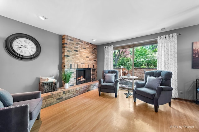 622 Katherine St, Saint Charles, IL 60174 - living area featuring wood finished floors and a fireplace