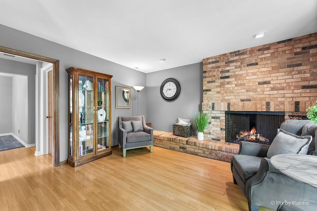 622 Katherine St, Saint Charles, IL 60174 - living room featuring wood finished floors and a fireplace