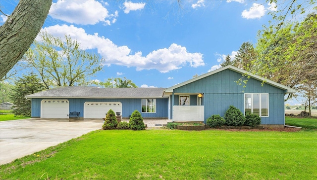ranch-style house with an attached garage, concrete driveway, and a front lawn