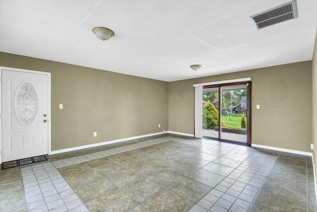 interior space featuring visible vents and baseboards