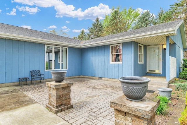 back of property featuring a patio area