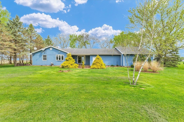 ranch-style home with a front lawn