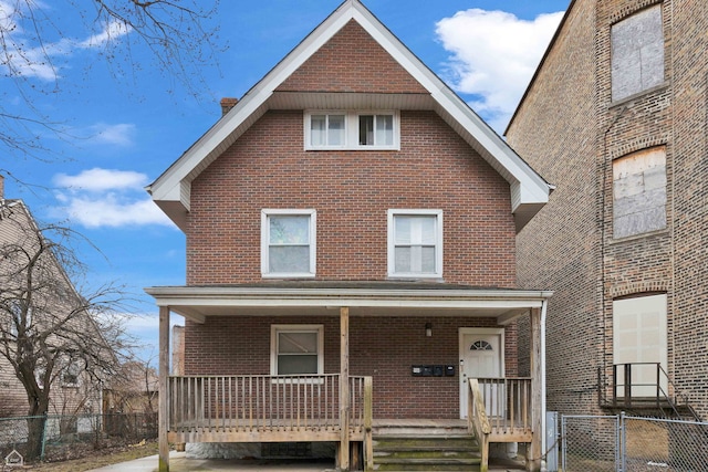 1533 E 65th Pl, Chicago, IL 60637 - view of front of property featuring covered porch, brick siding, and fence
