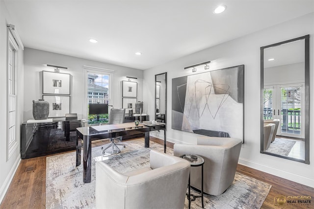 office area with baseboards, wood finished floors, and recessed lighting