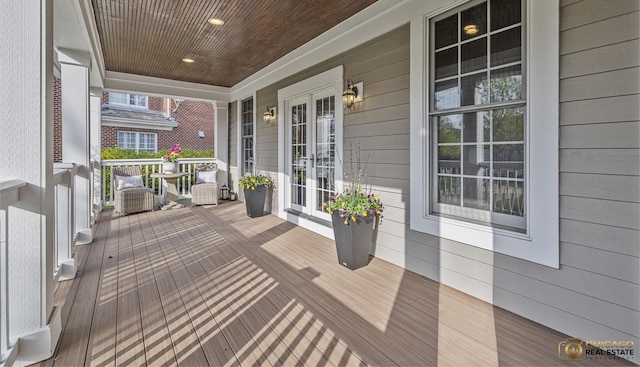deck featuring covered porch