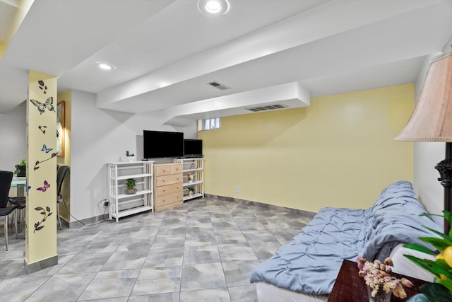 interior space with baseboards, recessed lighting, and visible vents
