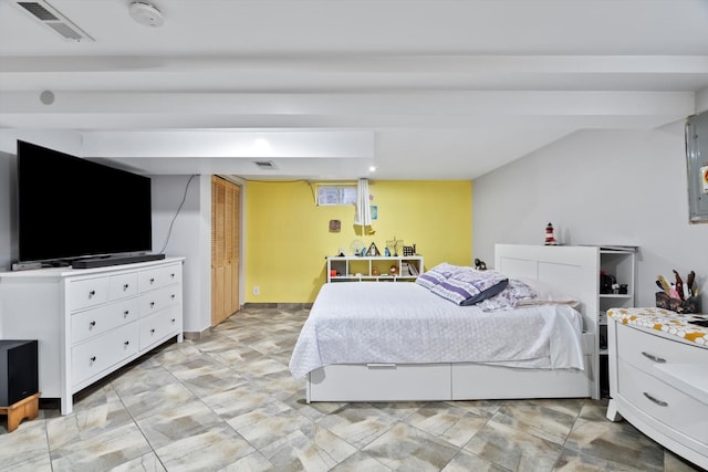 bedroom featuring visible vents