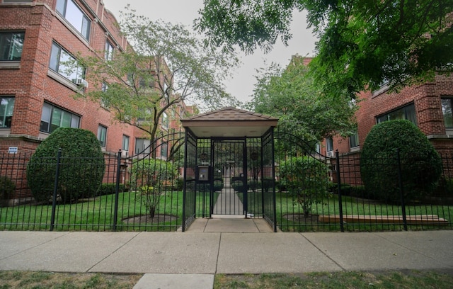 exterior space featuring fence private yard and a lawn