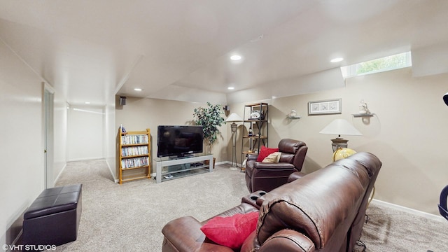living room featuring carpet, baseboards, and recessed lighting