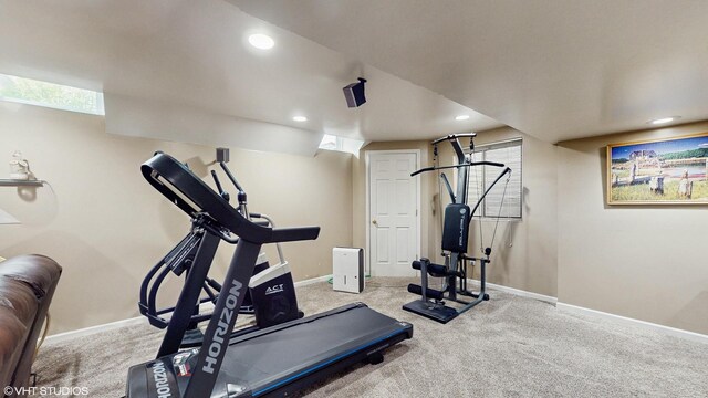 exercise room featuring carpet flooring, baseboards, and recessed lighting