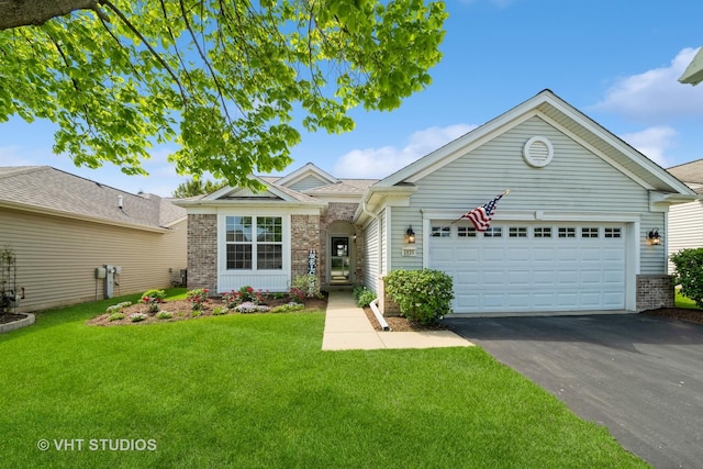 2835 Cascade Falls Cir, Elgin, IL 60124 - single story home featuring driveway, brick siding, an attached garage, and a front yard