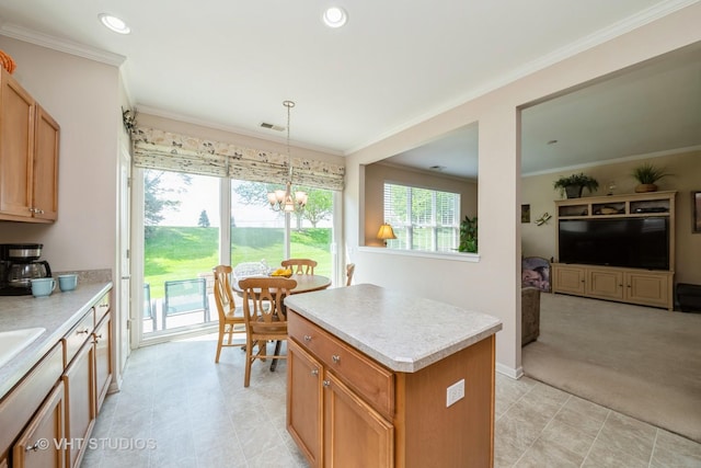 2835 Cascade Falls Cir, Elgin, IL 60124 - kitchen featuring light countertops, a center island, hanging light fixtures, recessed lighting, and crown molding