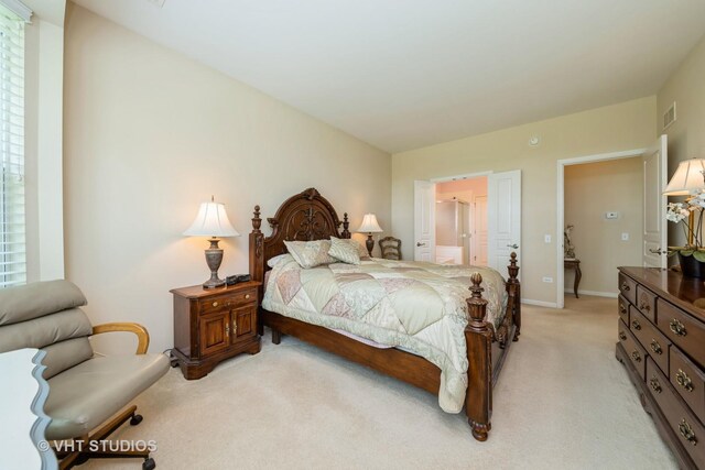 2835 Cascade Falls Cir, Elgin, IL 60124 - bedroom featuring light colored carpet, baseboards, and connected bathroom