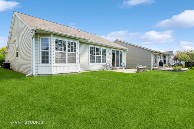 2835 Cascade Falls Cir, Elgin, IL 60124 - rear view of house featuring a patio area, central air condition unit, a yard, and a shingled roof