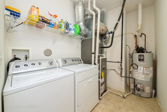 2835 Cascade Falls Cir, Elgin, IL 60124 - washroom featuring gas water heater, washer and dryer, baseboards, and light tile patterned floors