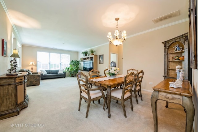 2835 Cascade Falls Cir, Elgin, IL 60124 - dining room featuring light carpet, ornamental molding, and a chandelier