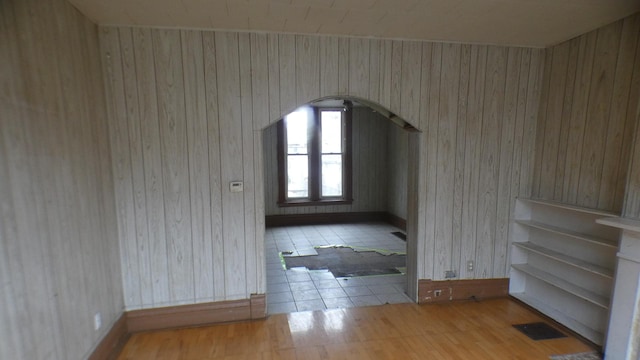 1910 S Spaulding Ave, Chicago, IL 60623 - interior space featuring wooden walls, arched walkways, wood finished floors, and visible vents