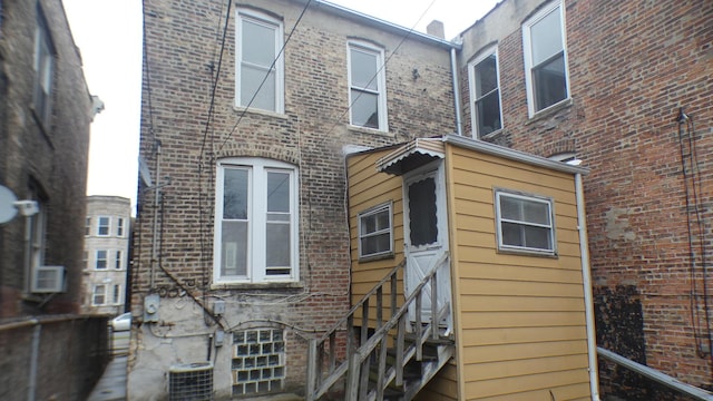 1910 S Spaulding Ave, Chicago, IL 60623 - rear view of house featuring cooling unit and brick siding