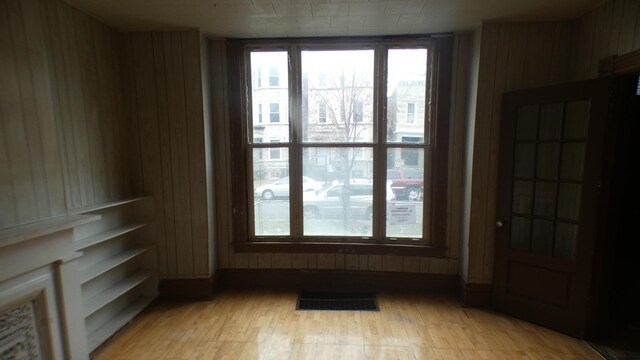 1910 S Spaulding Ave, Chicago, IL 60623 - empty room featuring visible vents and light wood-style floors