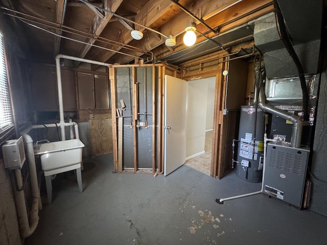 unfinished basement with water heater, heating unit, and a sink