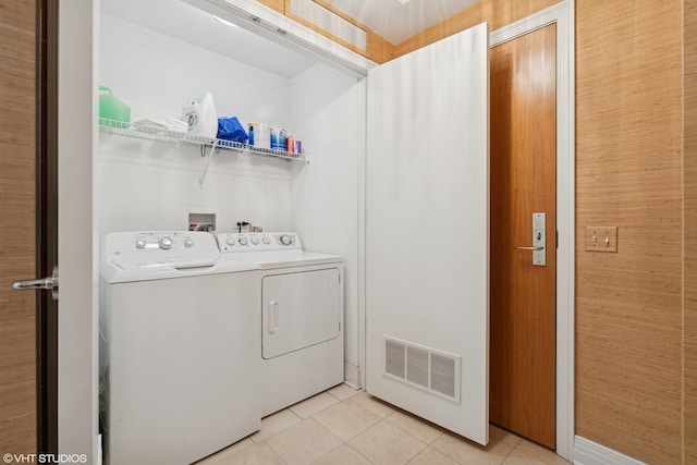 600 N Lake Shore Dr Unit 1309, Chicago, IL 60611 - laundry room featuring light tile patterned floors, laundry area, independent washer and dryer, and visible vents