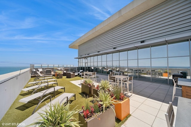 600 N Lake Shore Dr Unit 1309, Chicago, IL 60611 - view of patio / terrace with an outdoor hangout area and a water view