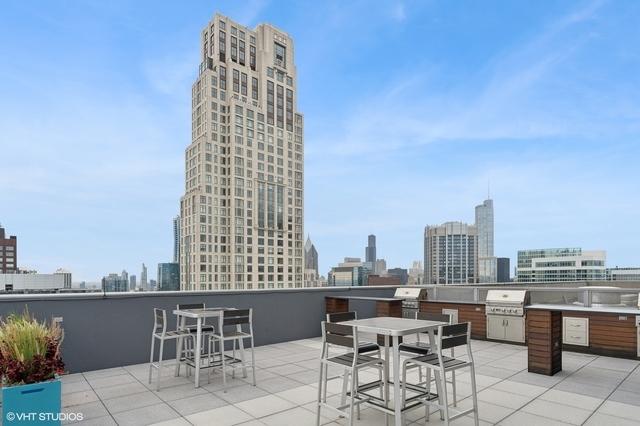 600 N Lake Shore Dr Unit 1309, Chicago, IL 60611 - view of patio featuring a grill, a view of city, and area for grilling