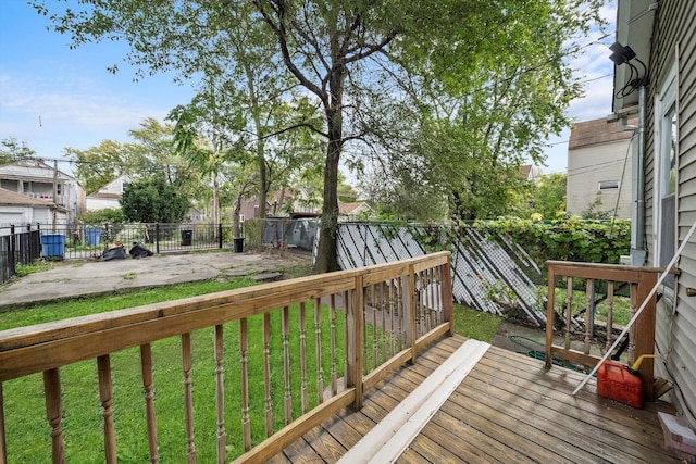 deck with a yard, a patio, and a fenced backyard