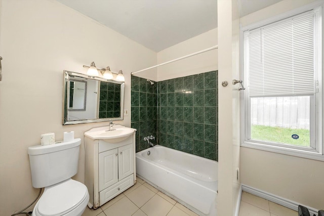 full bath featuring vanity, toilet, baseboards, shower / tub combination, and tile patterned floors