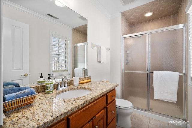 full bathroom featuring vanity, tile patterned flooring, a shower stall, and visible vents