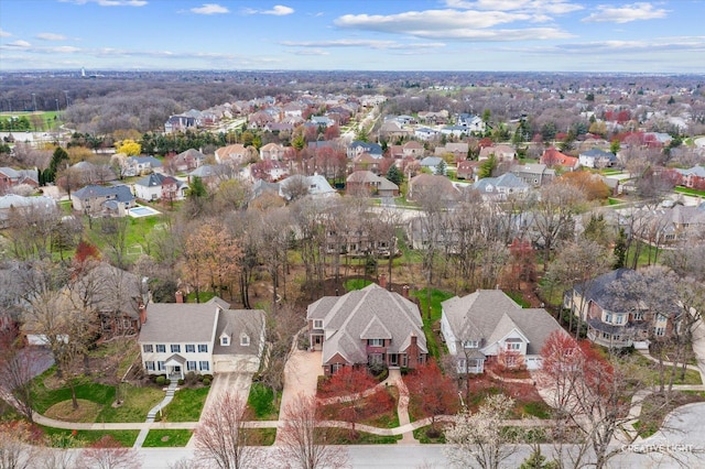 birds eye view of property with a residential view