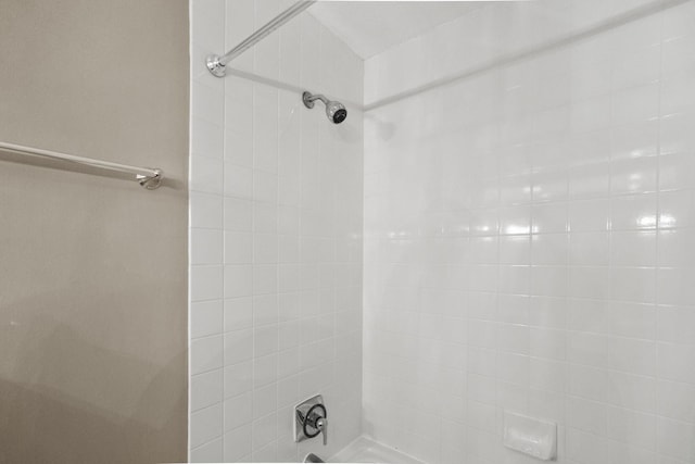 full bath featuring shower / washtub combination