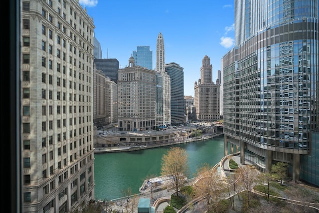 property's view of city featuring a water view