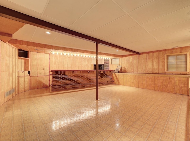 finished below grade area with wood walls