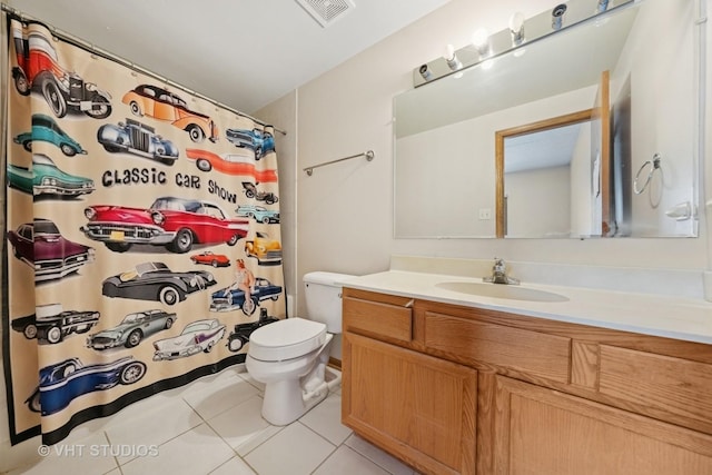9439 S 79th Ave Unit 102, Hickory Hills, IL 60457 - full bathroom featuring tile patterned flooring, toilet, vanity, and a shower with shower curtain