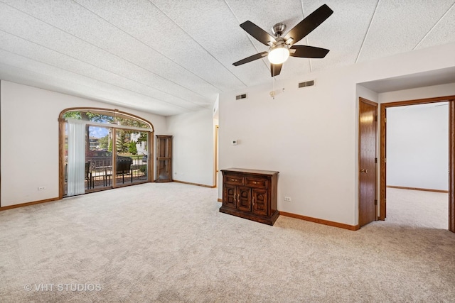 9439 S 79th Ave Unit 102, Hickory Hills, IL 60457 - empty room with carpet flooring, baseboards, ceiling fan, and a textured ceiling