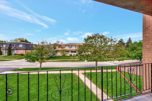 balcony featuring a residential view