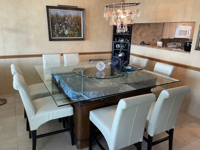 195 N Harbor Dr Unit 4908, Chicago, IL 60601 - dining room featuring light tile patterned floors and a notable chandelier