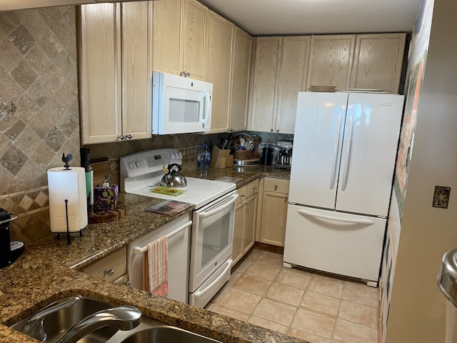 195 N Harbor Dr Unit 4908, Chicago, IL 60601 - kitchen with dark stone counters, tasteful backsplash, white appliances, and light brown cabinets