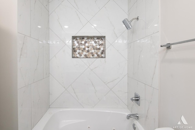 full bath with a combined bath / shower with jetted tub