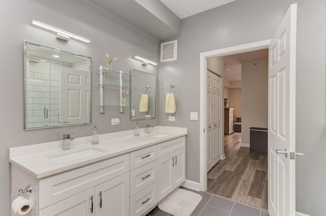 1111 S State St Unit A500, Chicago, IL 60605 - bathroom with a sink, tile patterned flooring, a stall shower, and double vanity