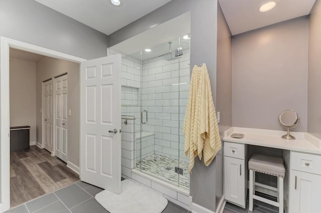 1111 S State St Unit A500, Chicago, IL 60605 - bathroom featuring tile patterned flooring, recessed lighting, baseboards, and a stall shower