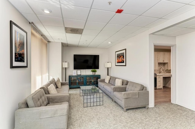 1111 S State St Unit A500, Chicago, IL 60605 - carpeted living area featuring baseboards, a sink, and a drop ceiling