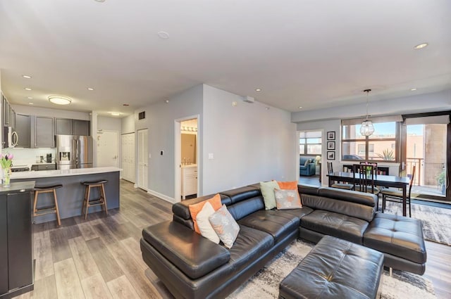 1111 S State St Unit A500, Chicago, IL 60605 - living room featuring light wood-style floors, recessed lighting, baseboards, and visible vents