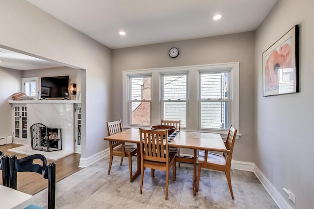 360 W Maple St, Lombard, IL 60148 - dining room featuring baseboards, a baseboard heating unit, recessed lighting, and a premium fireplace